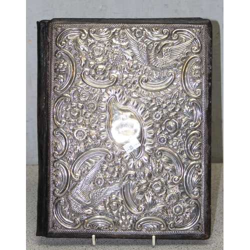 1022 - An antique silver fronted leather blotter, Birmingham 1902 by S.W. Smith & Co, approx 29cm x 23cm