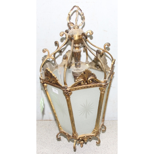 232 - Pair of vintage gilt metal pendant ceiling lanterns with opaque decorative glass approx. 39cm tall