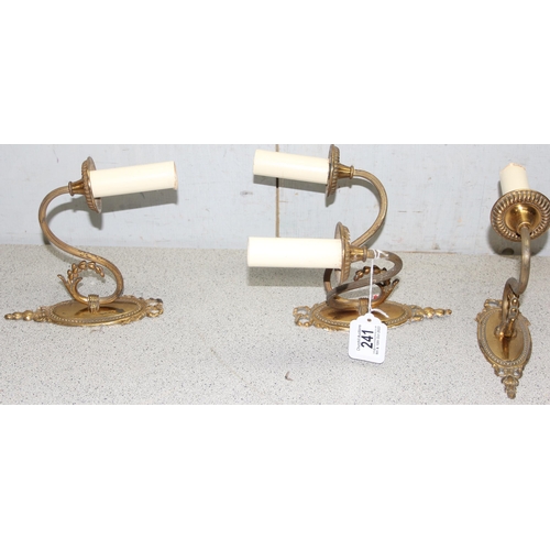 241 - A trio of metal decorative wall sconce electrical lights, 2 singles and a double, approx 23cm