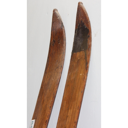 701 - Pair of Kandahar vintage wooden skis by A. Rossick? approx. 215cm long