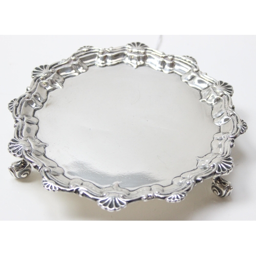 1004 - An antique Georgian style silver card tray with shell border, Chester 1910 by Barker Brothers (Herbe... 