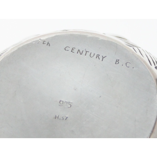 1010 - An unusual 925 silver bowl, the base marked to the base 925 and 7th Century BC, likely a copy of an ... 