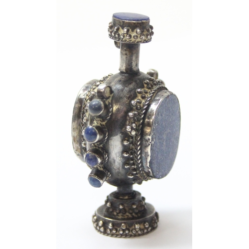 1011 - A Tibetan silver and hardstone snuff bottle, seemingly unmarked but XRF tests approx 92% silver, inl... 