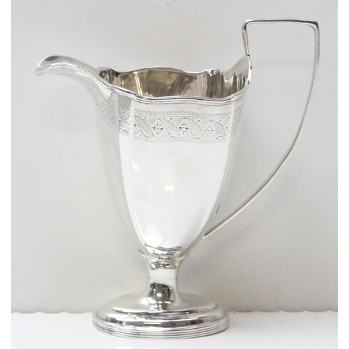 1030 - An antique silver milk or cream jug with engraved decoration, Sheffield 1923 by Mappin & Webb, appro... 