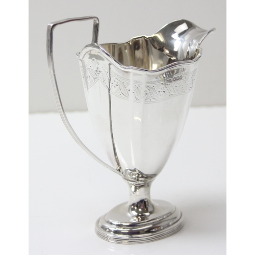 1030 - An antique silver milk or cream jug with engraved decoration, Sheffield 1923 by Mappin & Webb, appro... 