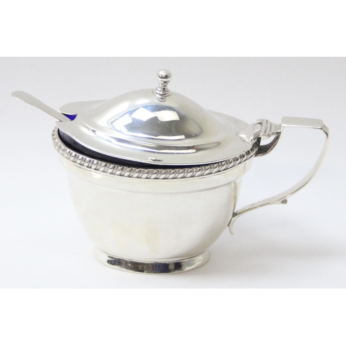 1036 - An extremely heavy gauge silver mustard pot, London 1903 by Charles Stuart Harris, with associated G... 