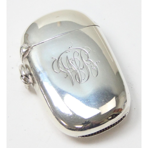 1039 - An antique silver vesta case of plain oval form, with engraved initials, Birmingham 1897 by Joseph G... 