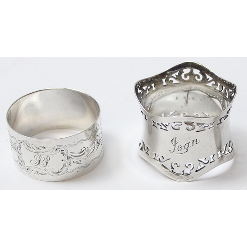 1040 - 2 silver napkin rings and a pair of silver sugar tongs, various dates and makers, approx 65.58g gros... 