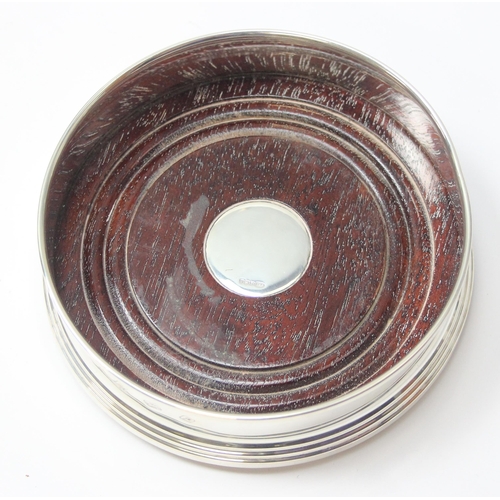 1042 - Silver and wooden wine coaster, Birmingham 1989 by Broadway & Co, approx 12cm wide