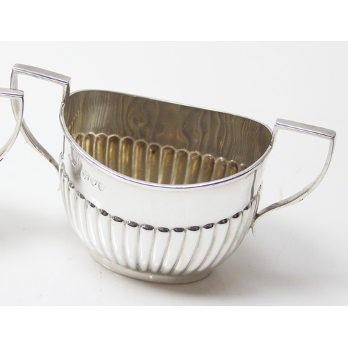 1047 - An antique 3 piece silver bachelor's tea set, London 1895 by Josiah Williams & Co (George Maudsley J... 