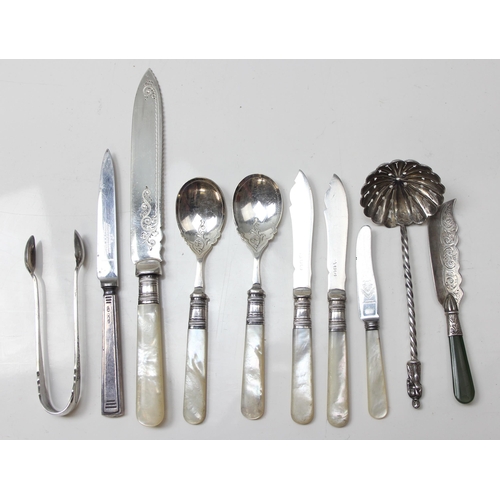 1067 - Qty of assorted cutlery to inc a silver apostle sugar sifter spoon, unmarked but XRF tests as silver... 