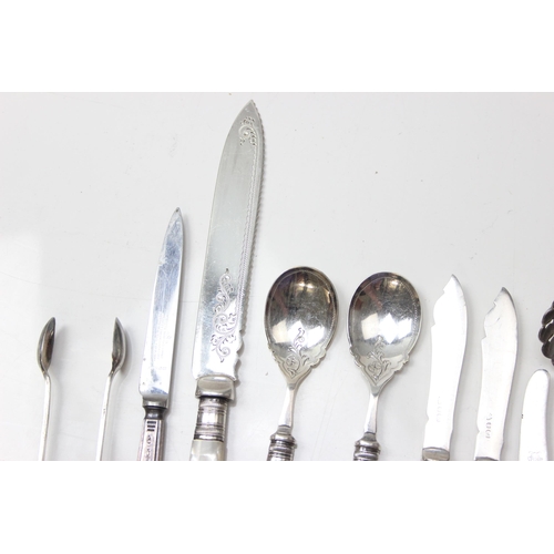 1067 - Qty of assorted cutlery to inc a silver apostle sugar sifter spoon, unmarked but XRF tests as silver... 