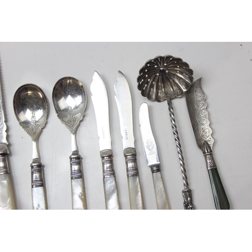 1067 - Qty of assorted cutlery to inc a silver apostle sugar sifter spoon, unmarked but XRF tests as silver... 