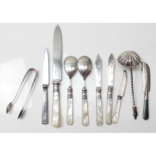 1067 - Qty of assorted cutlery to inc a silver apostle sugar sifter spoon, unmarked but XRF tests as silver... 