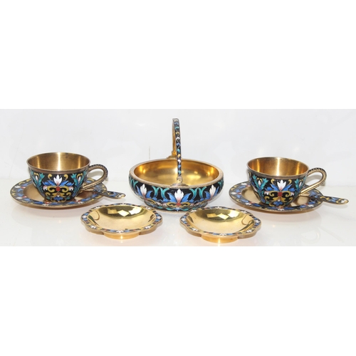 1070 - A Russian silver gilt and champlevé or cloisonné enamel 2 person tea set comprising of 2 tea cups an... 