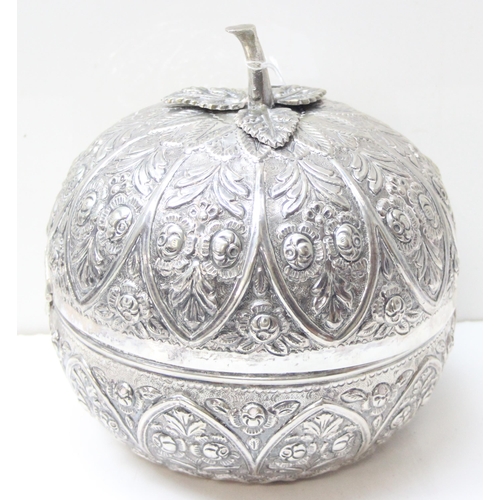 1078 - A large silver pumpkin shaped keepsake box, the exterior decorated with repousse flowers, the hinged... 