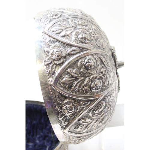 1078 - A large silver pumpkin shaped keepsake box, the exterior decorated with repousse flowers, the hinged... 