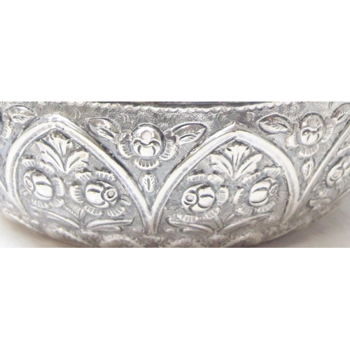 1078 - A large silver pumpkin shaped keepsake box, the exterior decorated with repousse flowers, the hinged... 