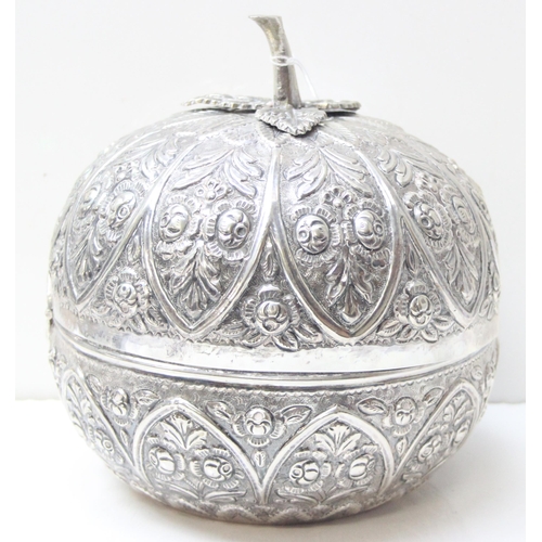 1078 - A large silver pumpkin shaped keepsake box, the exterior decorated with repousse flowers, the hinged... 