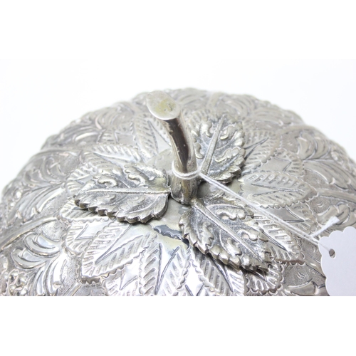 1078 - A large silver pumpkin shaped keepsake box, the exterior decorated with repousse flowers, the hinged... 