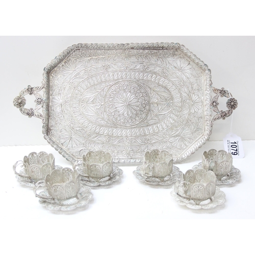 1079 - A highly decorative silver filigree serving tray, with 6 matching saucers and 6 cup holders, all see... 