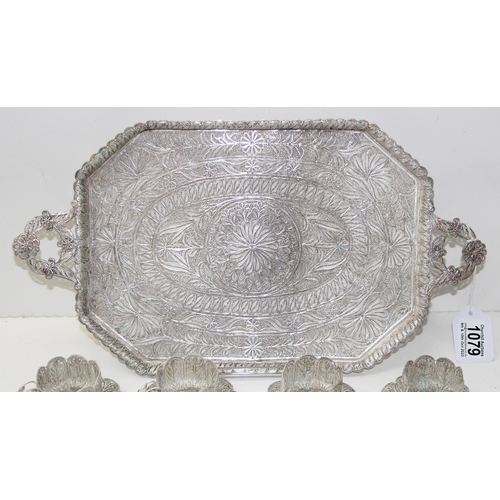 1079 - A highly decorative silver filigree serving tray, with 6 matching saucers and 6 cup holders, all see... 