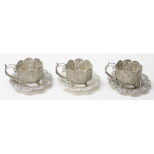 1079 - A highly decorative silver filigree serving tray, with 6 matching saucers and 6 cup holders, all see... 