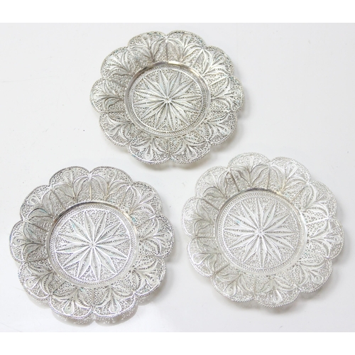 1079 - A highly decorative silver filigree serving tray, with 6 matching saucers and 6 cup holders, all see... 