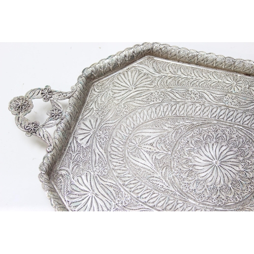 1079 - A highly decorative silver filigree serving tray, with 6 matching saucers and 6 cup holders, all see... 