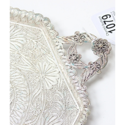 1079 - A highly decorative silver filigree serving tray, with 6 matching saucers and 6 cup holders, all see... 