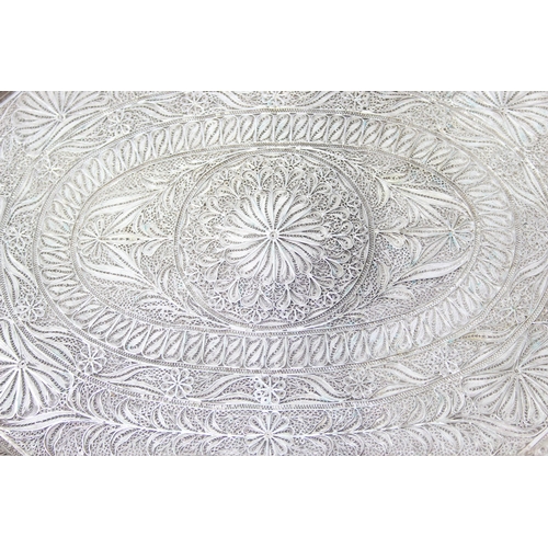 1079 - A highly decorative silver filigree serving tray, with 6 matching saucers and 6 cup holders, all see... 