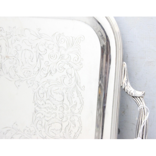 1081 - An extremely large Italian silver plated serving tray with engraved decoration made by Teghini of Fl... 