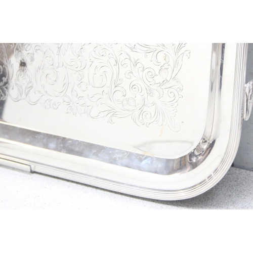 1081 - An extremely large Italian silver plated serving tray with engraved decoration made by Teghini of Fl... 