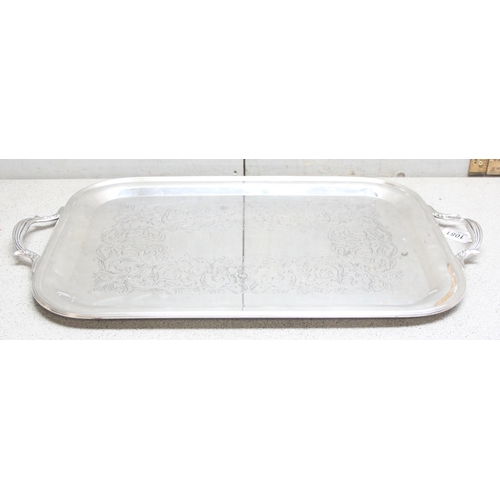 1081 - An extremely large Italian silver plated serving tray with engraved decoration made by Teghini of Fl... 