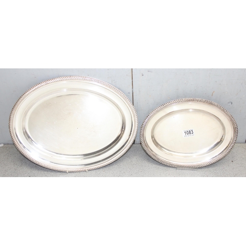 1083 - 2 large vintage silver plated serving dishes with reeded edges, indistinctly marked to reverse, the ... 