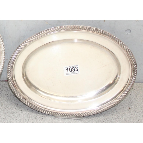 1083 - 2 large vintage silver plated serving dishes with reeded edges, indistinctly marked to reverse, the ... 