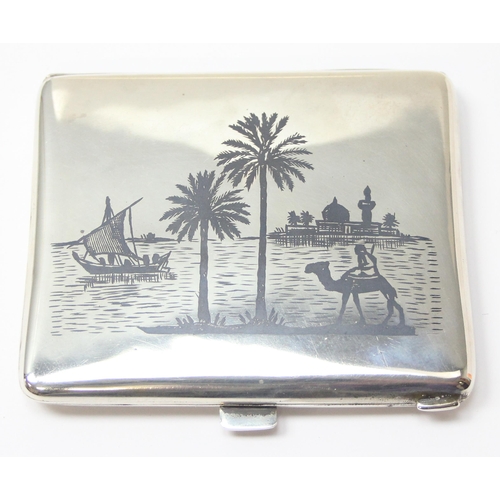 1090 - A fine Iraqi silver & niello cigarette case, each side decorated with scenes of boats and palm trees... 