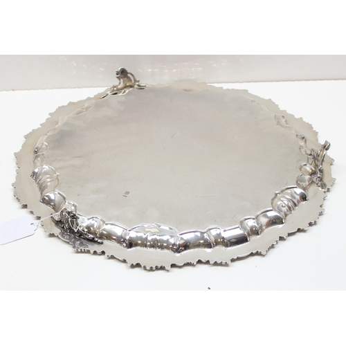 1071 - An extremely large and heavy cast solid silver tray, marked with Arabic hallmarks, likely of Emirati... 