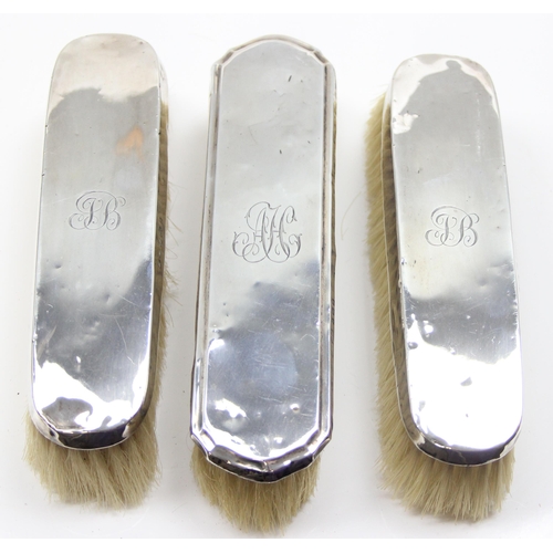 1095 - 4 early 20th century silver backed brushes, various dates and makers