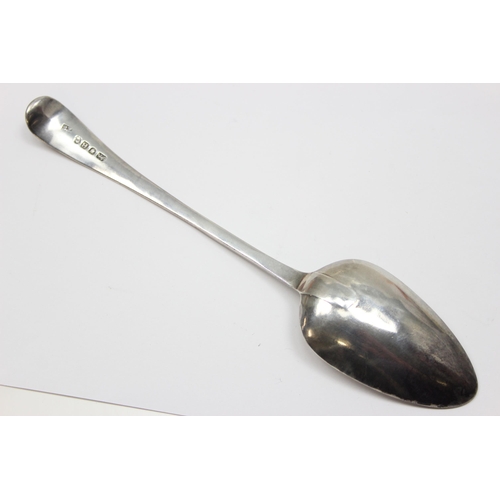 1097 - A George III period silver serving spoon with bright cut decoration, London 1797 by Thomas Streetin,... 