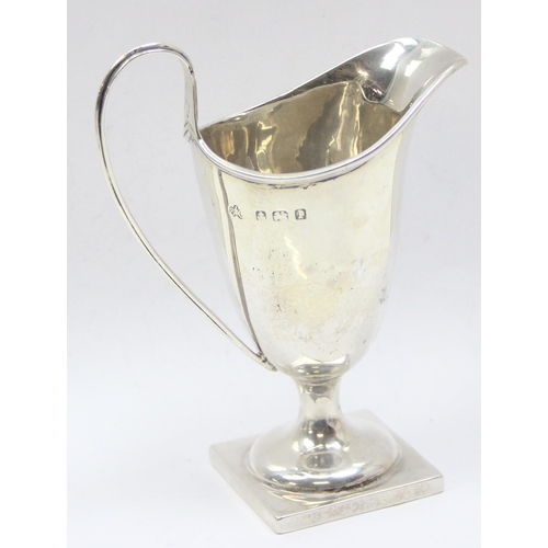 1099L - A small silver helmet shaped cream jug, Birmingham 1910 by Elkington & Co, approx 77.55g gross