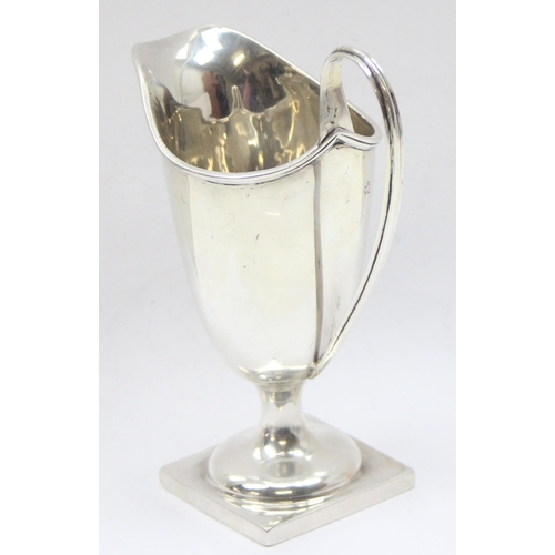 1099L - A small silver helmet shaped cream jug, Birmingham 1910 by Elkington & Co, approx 77.55g gross