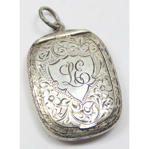 1099O - A silver pill box with engraved floral decoration and gilt interior, Chester 1918 by Adie & Lovekin