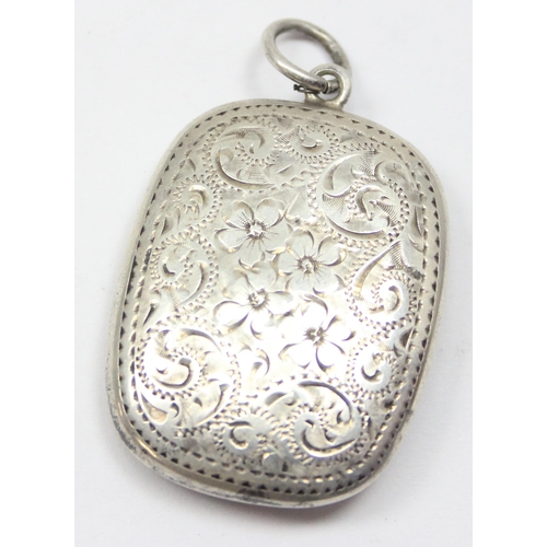 1099O - A silver pill box with engraved floral decoration and gilt interior, Chester 1918 by Adie & Lovekin