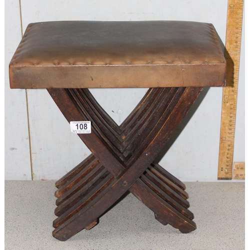 108 - Vintage wooden framed leather topped folding stool, approx 37cm tall