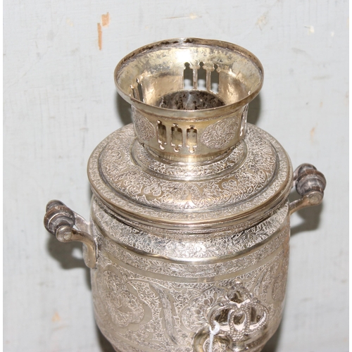 1086 - A vintage silver plated samovar with Islamic designs and a silver plated cigarette case of similar d... 