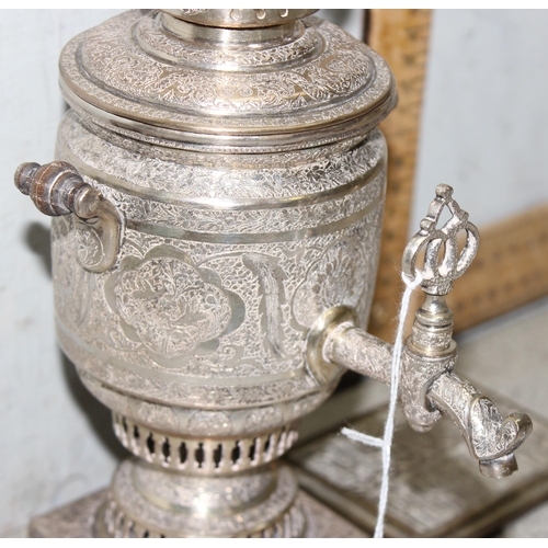 1086 - A vintage silver plated samovar with Islamic designs and a silver plated cigarette case of similar d... 