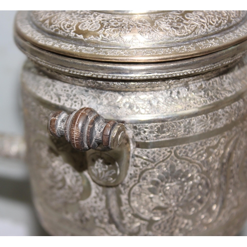 1086 - A vintage silver plated samovar with Islamic designs and a silver plated cigarette case of similar d... 