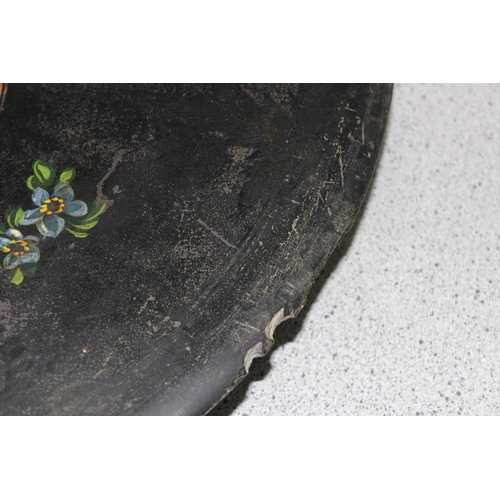 110 - A very unusual antique painted round slate table-top with hand-painted decoration of flowers and bir... 