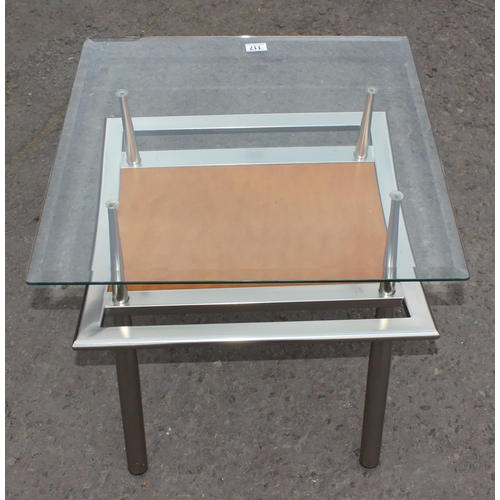 117 - A retro style chrome and glass topped table, approx 61cm square x 60cm tall